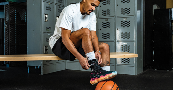 How can the ankle braces that Trae Young wear help perform at his best?